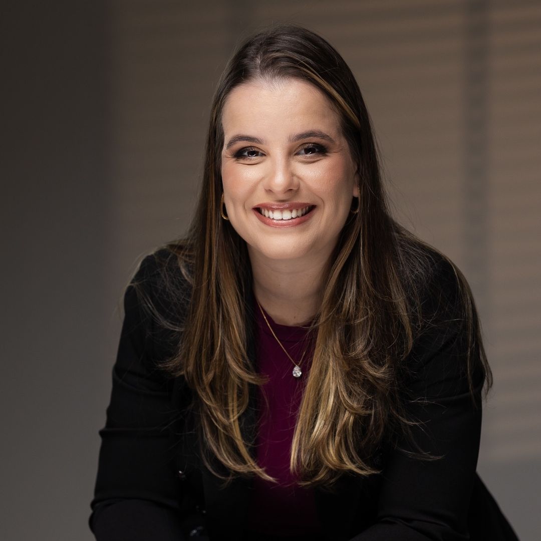 Bruna Pessotti, advogada, sorrindo